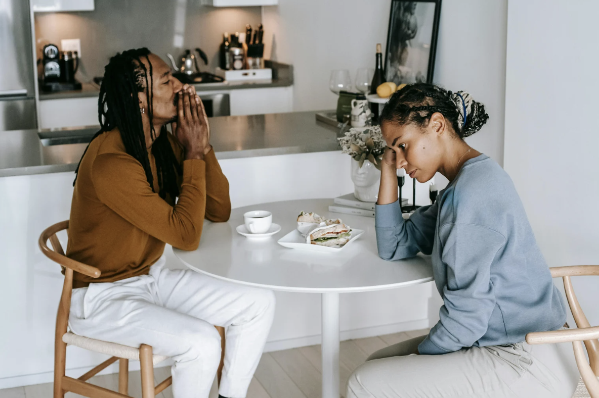 A couple arguing and turned away from each other